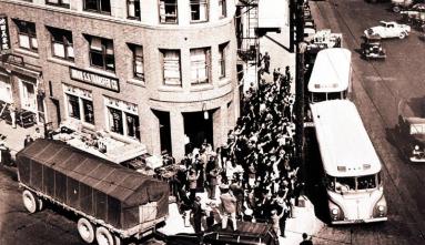buddhist temple on 1st street with busses loading to take the japanese americans to the concentration camps